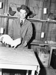 Merle C. Soules with his prize-winning White Leghorn cockerel