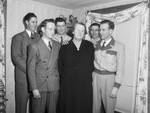 Mrs. Beulah Crittenden of Liberator Village with her son and sons in law