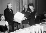 Amon Carter presenting gift to General and Mrs. Yount