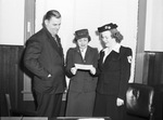 Mrs. Roger Owings, Red Cross Motor Corps director, and Miss May Belle Carter, Camp Fire Girl field worker, shown with Frank Weatherford
