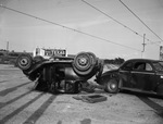 Overturned car of J. H. Barnes