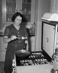 Mrs. Jim Webb, cooking