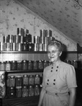 Miss Hazel Munger and canned goods