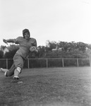 Football, Polytechnic High School. C. D. Allen in action.