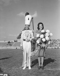 Football Texas Christian University Arkansas spectators. Band sweetheart for the day was Miss Jean Montgomery, Sweetwater, and Tom Barber, drum major.