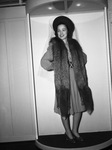Margaret Kelley modeling silver fox skins