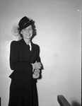 Mrs. Walter Strong, chairman of reservations for Junior Woman's Club dinner dance