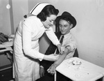 United States (U. S.) Army volunteers go through medical examination