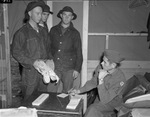 Military training at Camp Bowie, Brownwood, Texas, World War II; men of Company B, 142nd Infantry, from left, Pvts. Ira E. Galloon, Travis B. Bohannon, and Sergt. Leo A. White