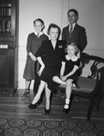 Mrs. Kenneth Covell and children, Tommy (left), Kenneth Junior right and Dorothy