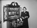 Mrs. S. A. Agee and her collection of goblets