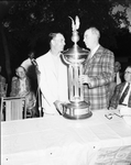 Ben Hogan accepts winner's trophy at the National Invitation Tournament by Al Panzera