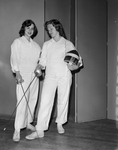 Two Texas State College for Women fencing team members