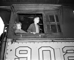 JoAnn Cansler and Jimmie Ball inside of the engine of a train