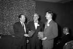 James Richardson presents plaques to Doyle Willis and Criss Cole