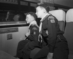 Two Cub Scouts on train