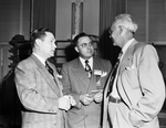 J. W. Carrington, Carl Flores and district luitenant governor I. W. Traxler