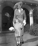 Mrs. Kenneth Wickett and daughter