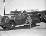 Kennedale Fire Marshal E. E. Brown, Kennedale Mayor Norman T. Childres, and Fire Chief W. B. Cromer