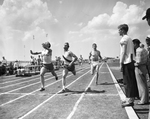 440 yard dash three -way track meet at TCU by Al Panzera