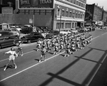 Apache Belles in parade for the National Intercollegiate Rodeo Association