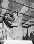 General Douglas MacArthur on stage at Farrington Field