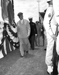 General Douglas MacArthur walking to the stage at Farrington Field