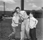 Glen and Lyn Bryers with Pfc. Virgil Gray by Joe McAulay