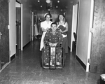 Billy Costa, with nurse Mrs. Mary McCoy, and wife, Helen