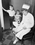 Mrs. Louise Sledge with her children, Robert Edward and James Ray by John Mazziotta
