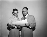 Bobby Patton, left, and Amon Carter Jr. look over scholarship awarded Bobby by the Star-Telegram