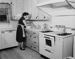 Mrs. Jasper Hendrick in kitchen
