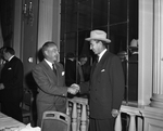 August C. Esenwein, manager of Convair's Fort Worth division and Secretary of the Army Frank Pace Jr.