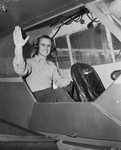 Reverend Morris in cockpit of plane