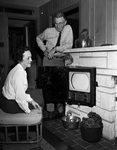 Mr. and Mrs. W. J. Overman and Their Television set