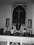 Earnest Langenhorst, pastor and altar boys