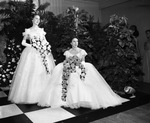 36th annual ball for The Assembly at River Crest Country Club; from left, cousins Mary Lynne Mulky (of Oklahoma City), and Betty Beavers, 11/09/1951 by Joe McAulay
