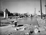 Final sections of concrete being poured on Sylvania Street at Yucca Avenue, Fort Worth, Texas