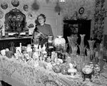 Mrs. Frank Casteel Shown With Collection of Vases