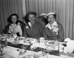 Cattlemen's wives luncheon and style show. L to R, Mrs. Marion Flynt of Midland; Mrs. T. L. (Jack) Roach and Mrs. W. J. Lewis Junior of Clarendon