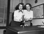 Maxine Mauldin and Gertrude Frazier, shown with bowling trophy
