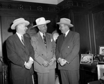 Amon Carter, center, shown with Roswell Magill, left, president of the Tax Foundation, Incorperation; and John W. Hanes, chairman of the board of the Tax Foundation.