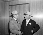 Amon Carter and John Holmes, the president of Swift & Company