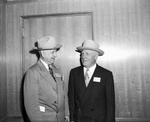 Amon Carter and John Holmes, the president of Swift & Company