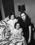 Mrs. J. J. Uri, with her daughters, Diane and Susan
