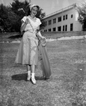 Weekend Fun Series. Mrs. Victor J. Chartrand of Lake Worth with golf clubs by Al Panzera