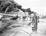 B-36 Carswell firefighters fighting fire on B-36