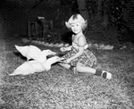 Cindy Lydick, 4, feeding ducks