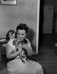 Mrs. Charles Neal and her kittens