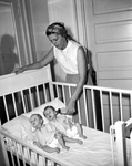 Miss Bertha Bassham with twin infants girls